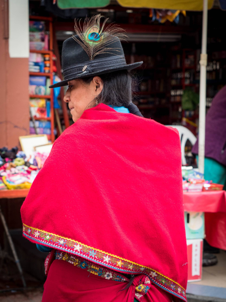 Indigenous women in the Cuenca area traditionally wear wool skirts and shawls with embroidered borders and wool fedora hats