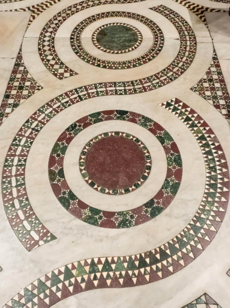 The church's 12th-century stone floor includes reused pieces of ancient Roman imperial purple porphyry