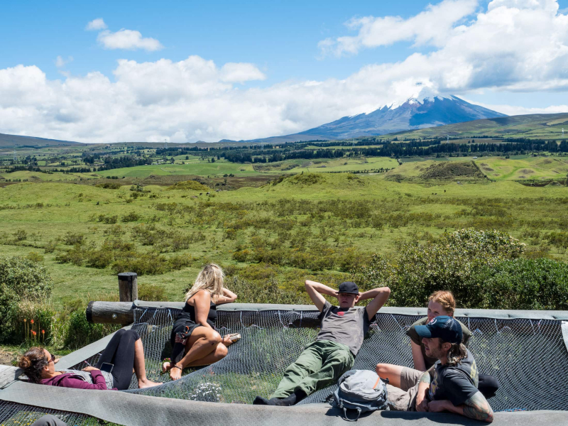 Hanging out on the hostel's hammock nets, admiring Cotopaxi volcano