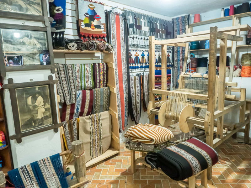 Finished products in the showroom at El Gran Condor weaving studio in Peguche