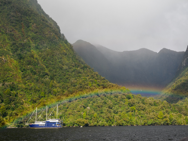 A rainbow over our ship, as seen from one of the motor boats