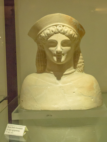 A stylized female figure from the 5th century BC