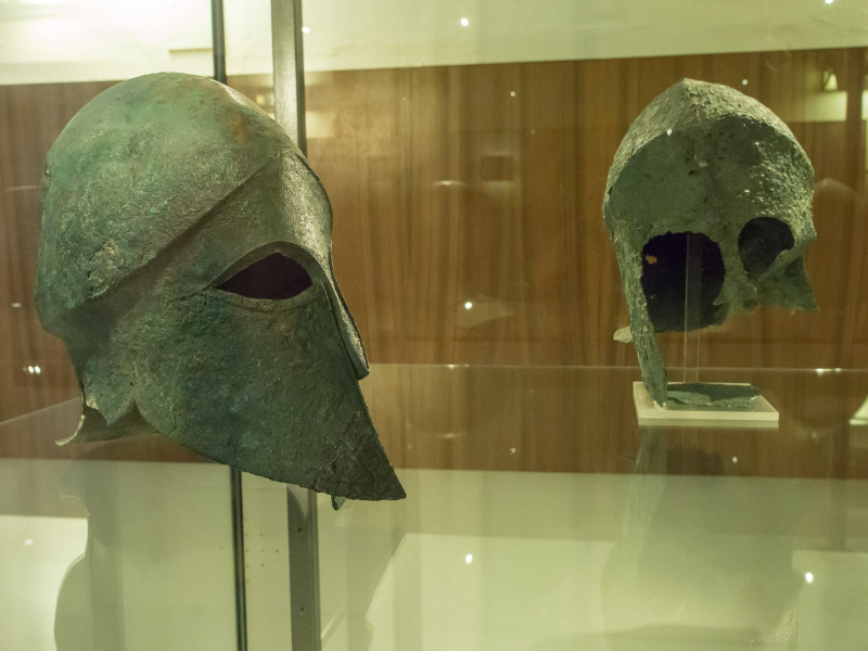 Bronze helmets of the type worn by Greek soldiers