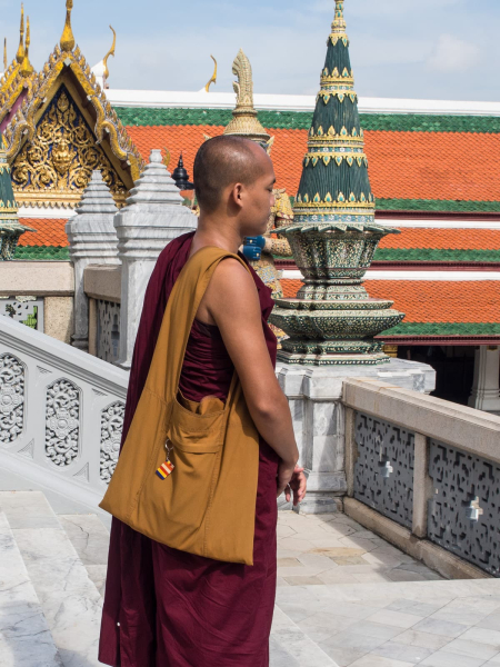A monk (possibly Burmese from the color of his robes) visiting Wat Phra Kaeo