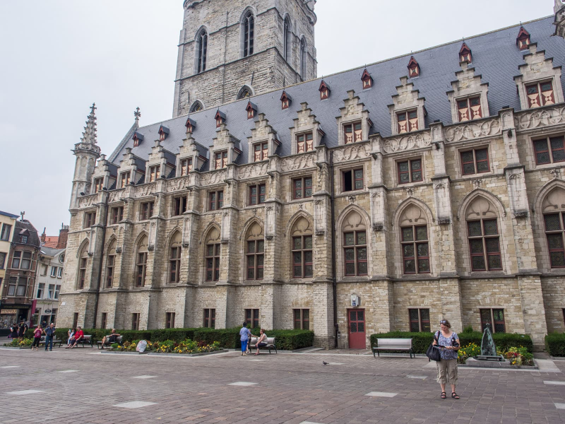 At the base of the clock tower is the 15th-century cloth hall, where merchants had their wares inspected before selling them