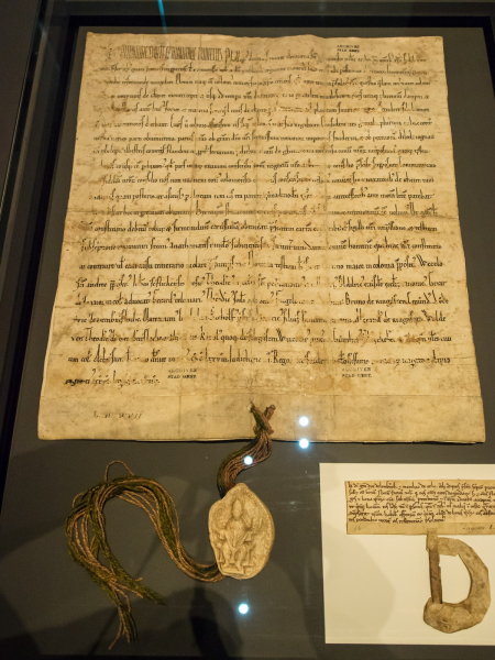 A 12-century contract involving Ghent's access to the Rhine River, with the seal of the local archbishop