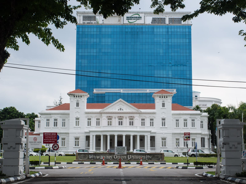 This grand mansion now houses a university, with a sky-scraper attachment