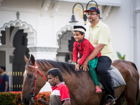 Horseback rides at a mosque festival