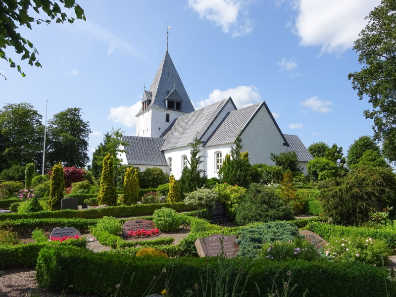 The village of Over Aastrup in southern Jutland has a pretty church with a garden-like cemetery