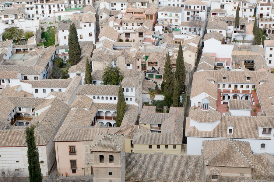 Old Moorish-era houses at the base of the Albaycin district. Note the traditional house shape of multi-story galleries around a central courtyard.