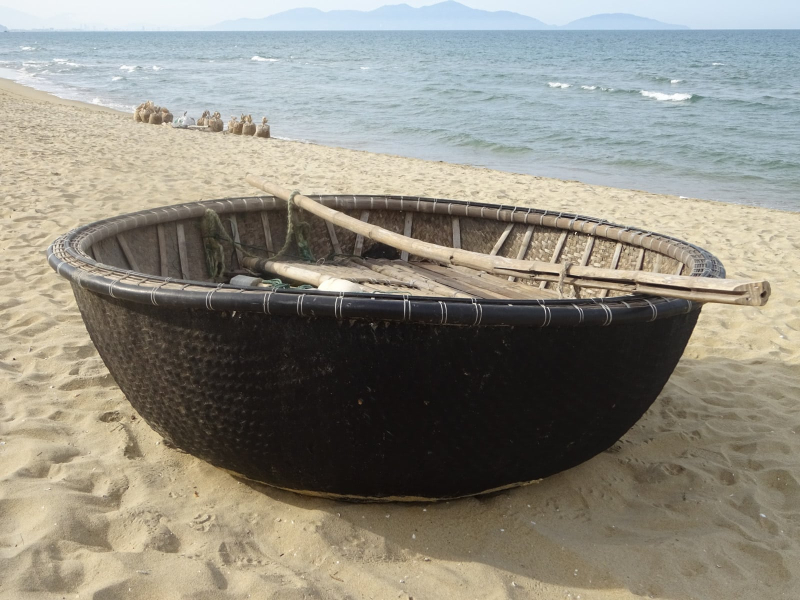 These round woven boats, called coracles, are unique to this part of Vietnam. They're used for close-in fishing and are very hard to steer.
