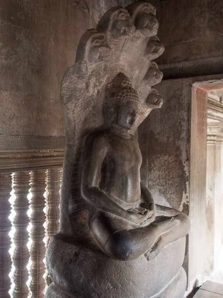 A Buddha sheltered by a naga (a mixture of Hindu and Buddhist elements)