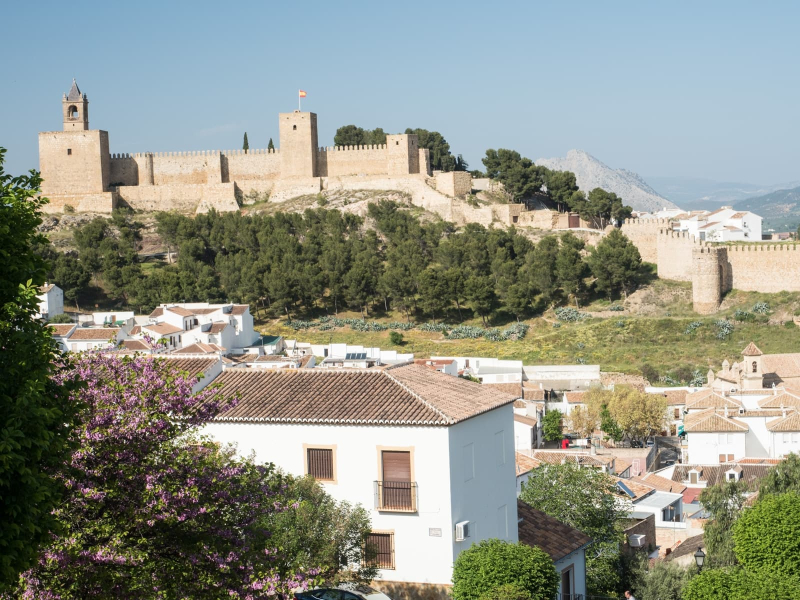 The 15th-century walls of the Alcazaba fortress crown the highest hill in Antequera