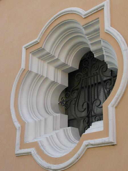 This unusual window shape is characteristic of Antigua