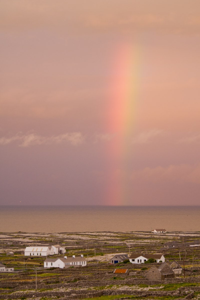A rainbow going into the sea