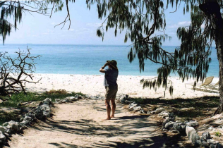 Chris near the beach on Wilson Island, a tiny coral atoll on the Great Barrier Reef where we spent three nights "glamping" in luxurious tents with only three other people and a private chef