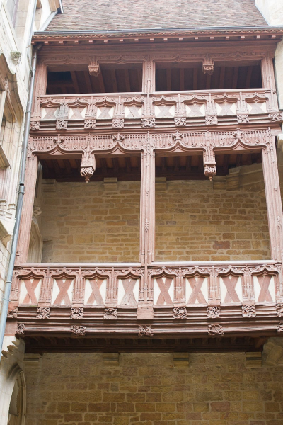 A courtyard in Dijon hides a carved wooden gallery . . .