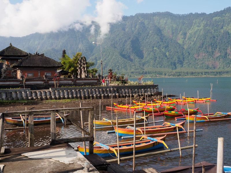 Lake Bratan in Candikuning, home to colorful canoes and one of the most famous temples in Bali