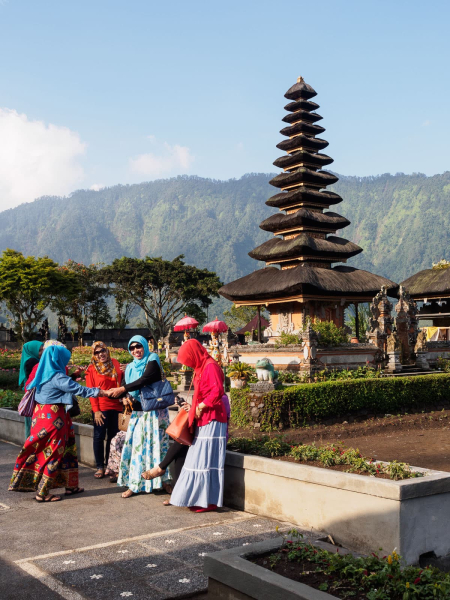 Muslim tourists (maybe from Java) visiting the temple, which is so famous that it appears on Indonesia's 50,000-rupiah bank note