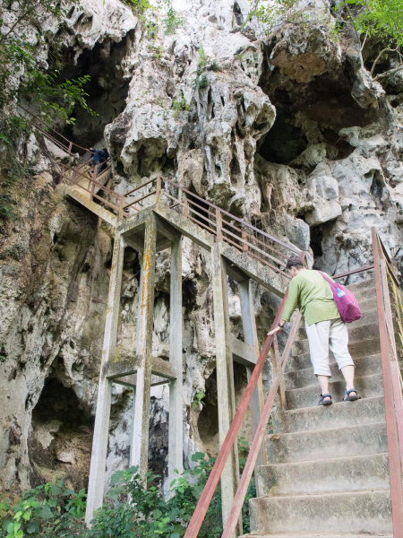 Climbing up to the mouth of the cave