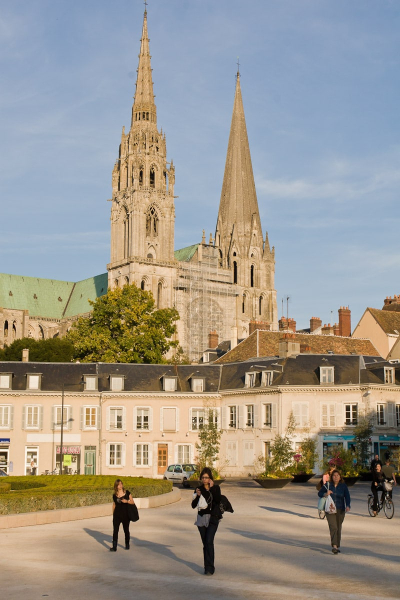 The cathedral, with its mismatched towers, rises over the town of Chartres
