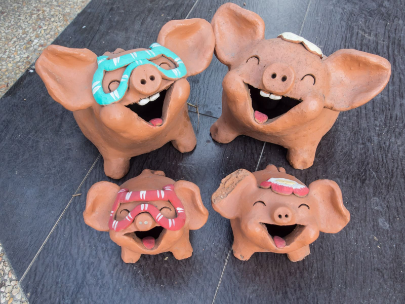 Not sure why there were singing pig figurines on the sidewalk near the massage place