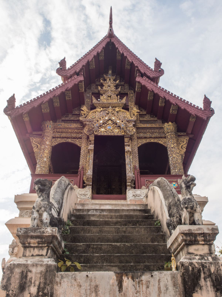 This building to house sacred documents is in an older Chiang Mai architectural style