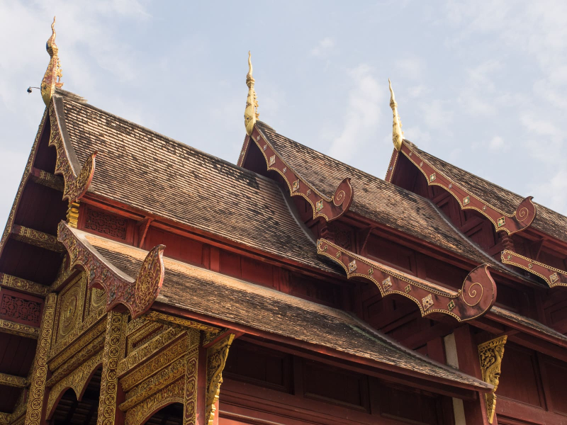 Temples in Chiang Mai often have a series of three nested roofs