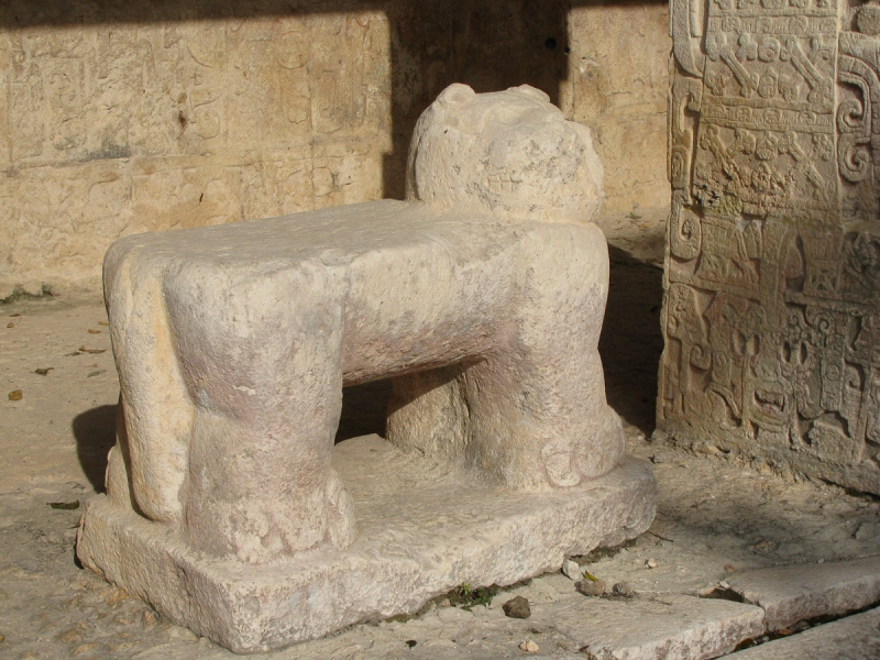 A jaguar-shaped throne next to the ball court