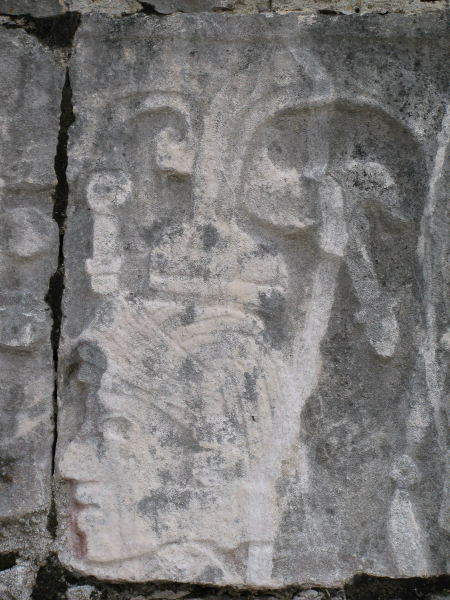 A carved face in profile