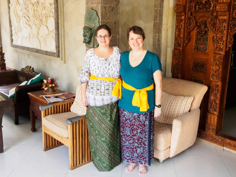 In our newly bought sarongs and sashes (proper attire for a religious ceremony), we were invited into the owner's house for dinner.