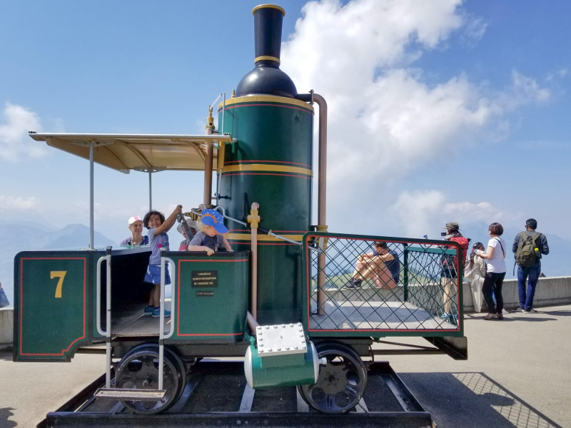 Francesca "driving" an old steam engine on Mount Rigi 