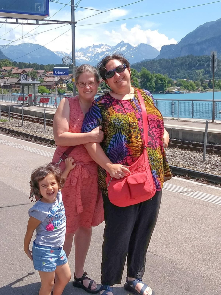 Francesca, Melissa, and AJ on the lakeside in Brienz