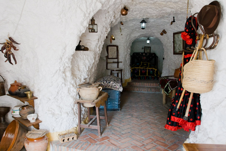 The interior of a typical cave house, on display at the Sacromonte interpretive museum. (Like houses in the city, the caves were often whitewashed with lime to look brighter and deter bugs.)