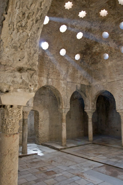 The holes in the ceiling of the bathhouse may have been filled with colored glass.