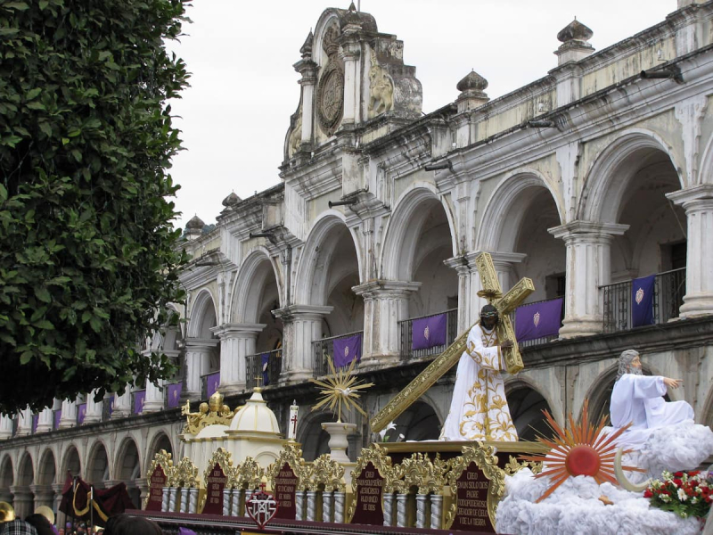 A float passes the 16th-century Captains Generals Palace on Antigua's main square, the administrative center of Spanish rule in Central America