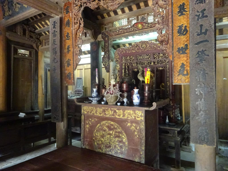 The main hall of the house includes an altar for worshiping the family's ancestors.