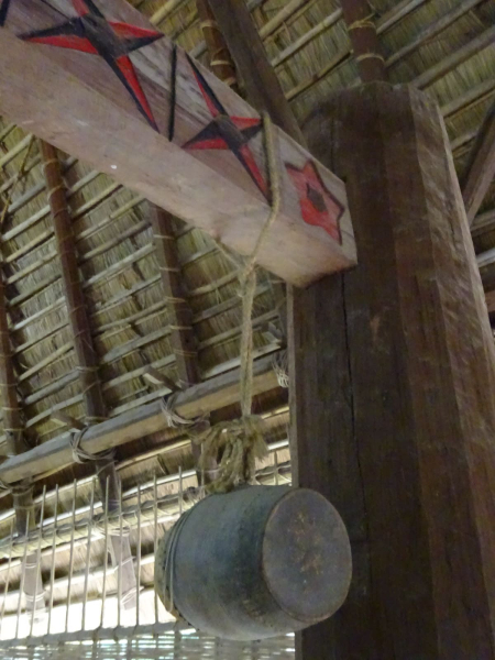 A drum hanging from one the Bahnar house's huge beams