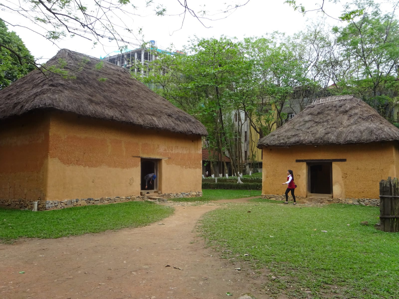 This house and stable of the Hani people of northern Vietnam were built for a cold mountain climate, with thick walls and no windows. They're very dark inside.