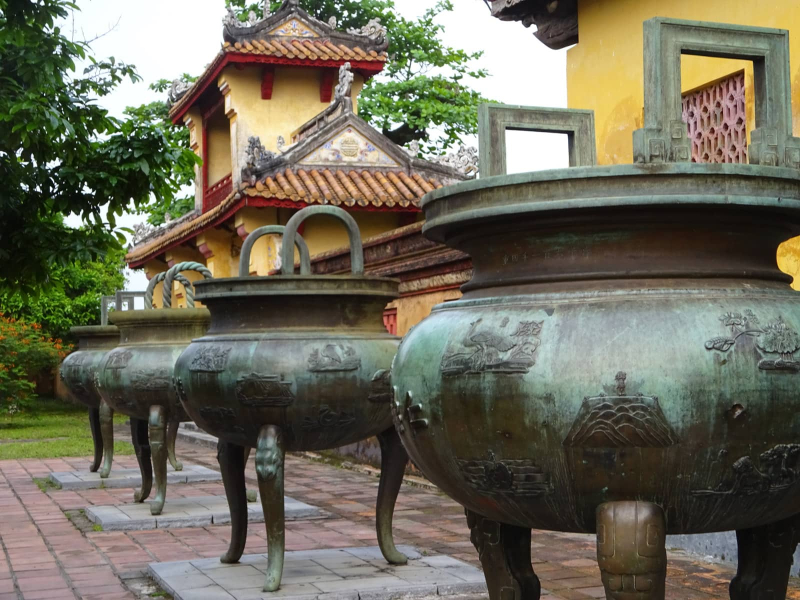 These huge bronze urns were cast in 1836 to symbolize the sovereignty of the Nguyen dynasty and were named after previous emperors
