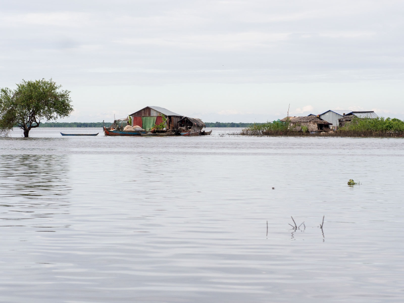 Farther out on the lake, fishing families live in floating houses that can move with the changing water level