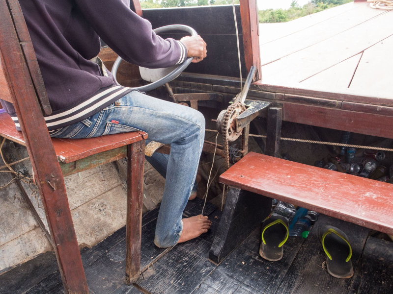 Our boat featured an old car steering wheel and an accelerator controlled by a wire held between the toes