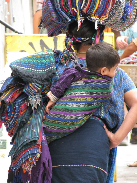 One of the many uses for the "everything cloth" that Guatemalan girls and women often wear over their shoulder.
