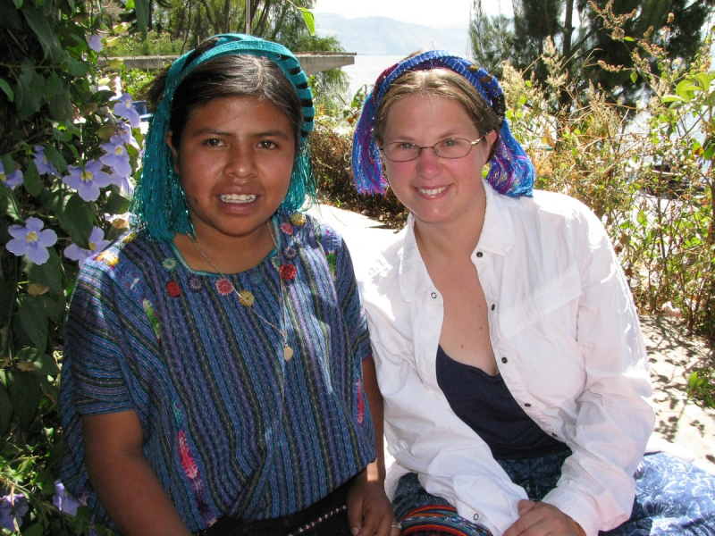 Melissa visits with 14-year-old Marina, who lives across the lake in the village of San Antonio Palopo and who travels to other villages during the day to sell products woven by her family (including head wraps)