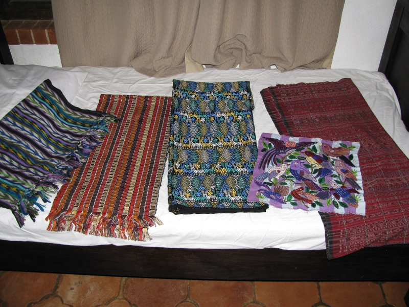 Our growing collection of Guatemalan textiles, all bought from the weavers, their relatives, or in their villages (to keep the money as local as possible)