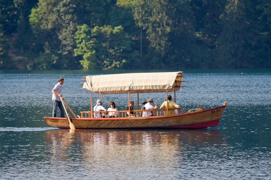 Visitors to Bled Island are ferried on special gondola-like row boats
