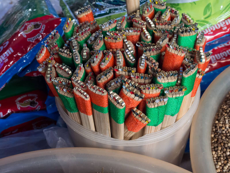 Lao ingenuity: homemade graters fashioned from bamboo and bent pieces of old soda cans