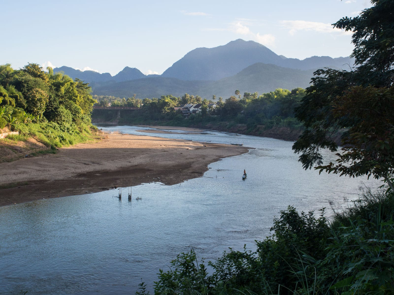 The Nam Khan river flows along one side of Luang Prabang, until it meets the Mekong river