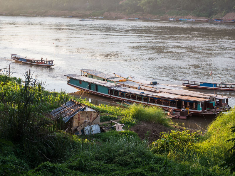 Bigger boats ply the wide Mekong river, which runs on the other side of Luang Prabang's peninsula