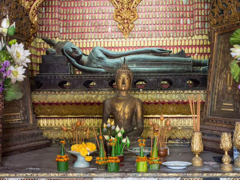 This rare reclining Buddha was carved in the 1500s